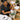 An eco-friendly spa worker correctly disposing of a biodegradable single-use face cradle liner into a green composting bin, symbolizing sustainable spa practices and zero-waste goals.