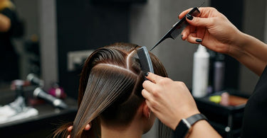 Rat Tail Comb used for precise hair parting in a salon setting