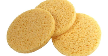 Round non-compressed natural sponges for spa and salon use