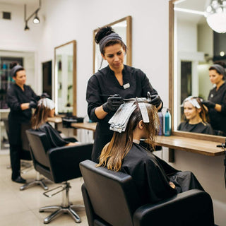 Salon Client Getting Hair Color Treatment