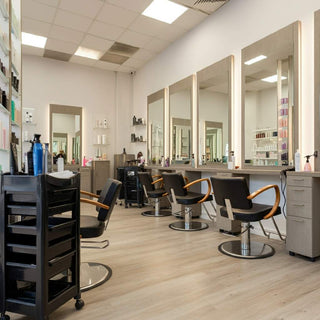 A clean and well-maintained salon showcasing pristine salon furniture and equipment.