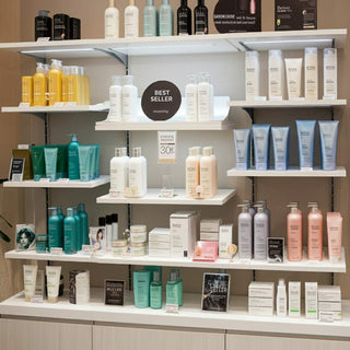 Salon retail display with beauty products.