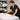 Esthetician using magnifying lamp with proper diopter setting for professional skin analysis in spa treatment room