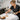 Selection of professional body scrubs with different micron sizes displayed on a spa table with white towels and bamboo accessories