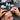 Selection of professional hair piece glues and adhesives for salon and barber use displayed on a white surface