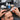 Selection of professional hair piece glues and adhesives for salon and barber use displayed on a white surface