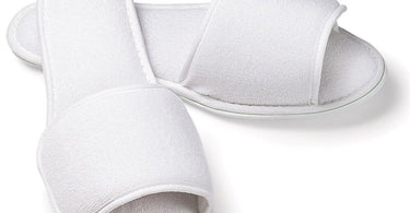 Pair of white terry cloth open-toe slippers with a velcro strap for men, designed for spa and salon use by Boca Terry, displayed on a white background.