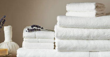 Freshly laundered spa towels and linens in a spa setting