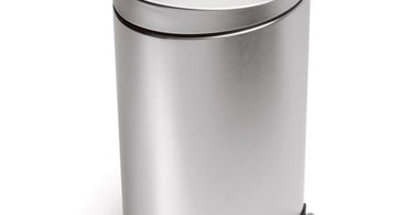 Sleek stainless steel semi-round trash can for spas and salons