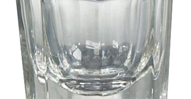 Star Nail Glass Dappen Dish Clear sitting on a professional manicure table with acrylic powders and nail brushes.