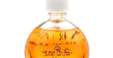 StarNail Scented Cuticle Oil in Mango shown in a 2.5 oz bottle on a white surface.