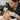 A professional esthetician performing a careful lash tinting service on a client in a clean, well-lit salon, highlighting safety and compliance with state board regulations.