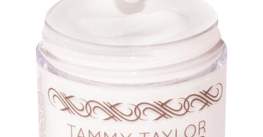 Tammy Taylor Nail Powder in Dramatic White, a professional acrylic powder for salon nail services.