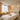 A serene spa treatment room with acoustic wall panels, soft lighting, and a massage table, emphasizing quiet and relaxation.
