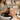 A client receiving a relaxing scalp massage during a hair treatment at a professional salon, highlighting the benefits of scalp massage.