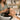 A client receiving a relaxing scalp massage during a hair treatment at a professional salon, highlighting the benefits of scalp massage.
