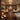 Spa professional setting up a wellness program with aromatherapy oils and massage tools