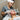 Esthetician performing a gentle waxing treatment on a client with rosacea-prone skin