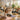 A serene spa treatment room with a massage table, a towel steamer, and professional products, symbolizing the rest and rejuvenation found in closing one day a week for business health.