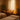 A compassionate esthetician consulting with a client, reviewing skincare products, in a safe and professional spa environment.