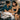 Professional esthetician having a consultation with a client in a modern, clean spa treatment room