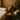 Professional spa therapist performing facial treatment on relaxed client in serene spa environment
