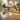 Eco-friendly bamboo flooring in a modern spa treatment room with massage table and plants.