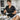 Esthetician adjusting height of professional waxing bed for proper ergonomic posture to prevent back pain