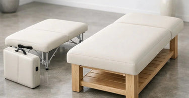 The Great Debate: Portable vs. Stationary Massage Tables - comparison image showing a folded portable massage table with a carrying case next to a plush, stationary electric massage table in a luxury spa setting.