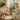A serene spa professional calmly listening to a client with empathy and understanding, representing effective conflict resolution in a beauty setting.