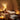 A serene spa environment with soft lighting, candles, and a relaxing atmosphere enhanced by calming music.