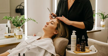 A relaxing scalp treatment being performed in a salon