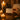 A spa professional's hand writing a personal note on a client's appointment card