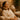 A client blissfully relaxing in a pedicure chair with a warm neck pillow, showcasing ultimate spa comfort and relaxation.