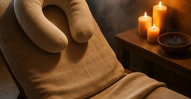 A warm flaxseed and lavender neck pillow used in a spa setting during a relaxing treatment