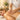 Close up of professional hands with confident, grounding hand placement on a client's back during a spa treatment, emphasizing the psychology of touch and proper technique.