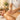 Close up of professional hands with confident, grounding hand placement on a client's back during a spa treatment, emphasizing the psychology of touch and proper technique.