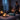 Spa professional comforting client during treatment with warm towels and serene atmosphere