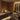 Luxury spa interior showcasing textured surfaces, plush towels, and natural materials for a serene ambiance