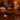 Close-up of a chocolate pedicure treatment showing creamy cocoa scrub being massaged onto well-groomed feet