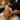 Professional dermaplaning treatment being performed with precision on client's cheek