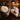 Professional barber performing hot towel straight razor shave in a luxury salon setting