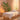 Peaceful Reiki healing session in a spa setting with soft lighting and practitioner's hands gently placed on client's head