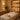 Spa professional performing a facial treatment on a relaxed client in a serene treatment room