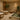 Serene spa environment designed as a third place haven with comfortable seating, natural materials, and warm lighting