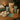 Assortment of disposable spa supplies including gloves, applicators, and liners neatly arranged