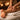Close-up of a client's foot during a spa massage, capturing the subtle twitch that signals a desire for more pressure