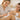 An esthetician calmly performing a waxing service on a relaxed client in a serene spa setting.