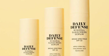 Tuel Skincare Daily Defense Mineral Sunscreen bottle with spa background