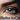 Before and after images showcasing the results of an eyelash tint and lift procedure.